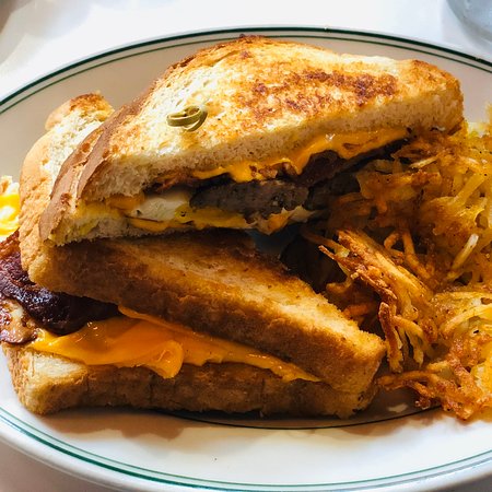 Little Duck Diner signature dishes Duck Grilled CheeseSouthern Shrimp and GritsChicken and Waffle